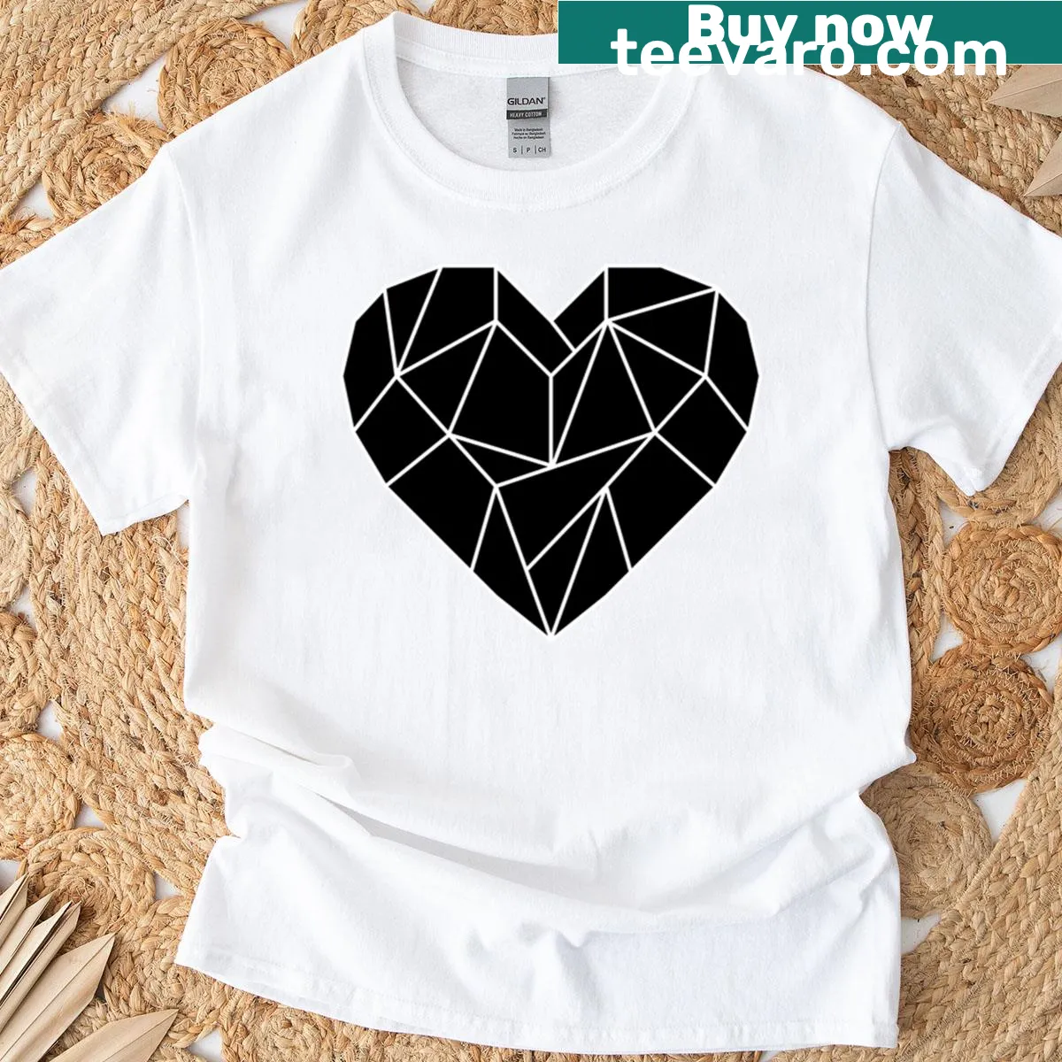 Vintage-style black heart graphic on a punk-inspired tee — on a men's t-shirt