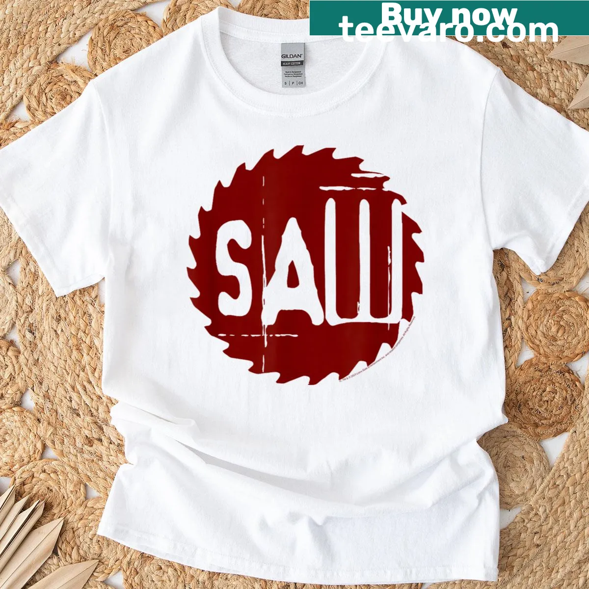 T-shirt featuring the Saw movie franchise red blade logo — on a men's t-shirt
