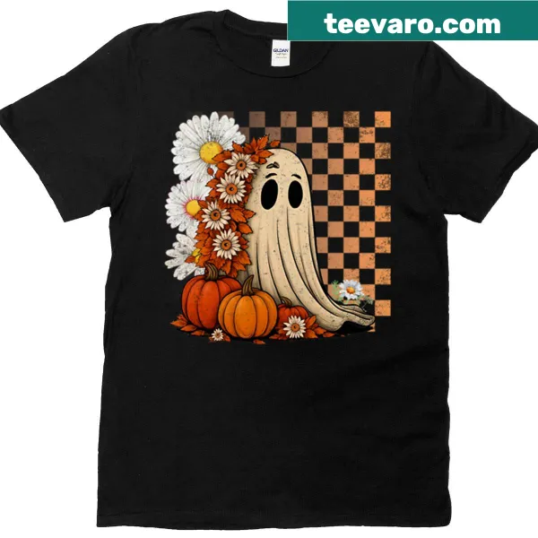 Cute shy ghost peeking from behind a tombstone on a t-shirt.