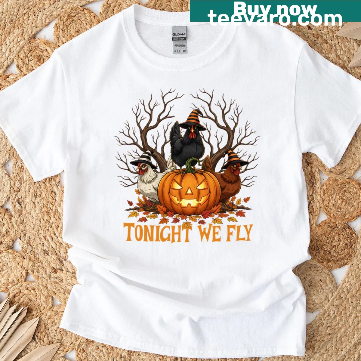 Funny Halloween T-shirt featuring a chicken in a witch costume — on a men's t-shirt