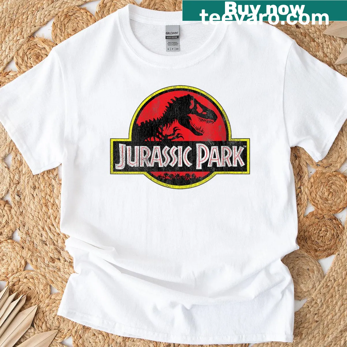 Distressed Jurassic Park logo T-shirt for women — on a men's t-shirt