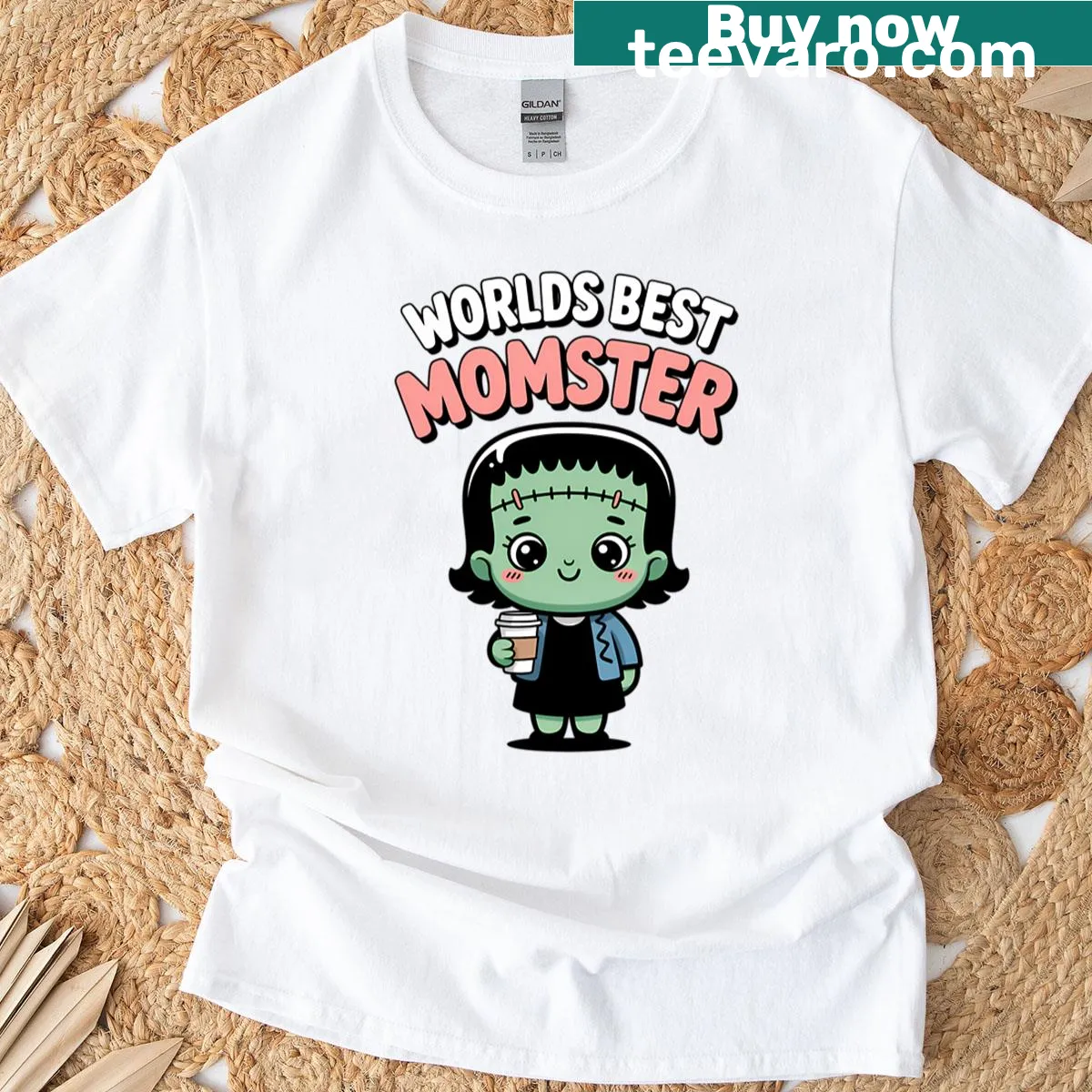 Cute monster graphic with 'World's Best Momster' text for Halloween — on a men's t-shirt