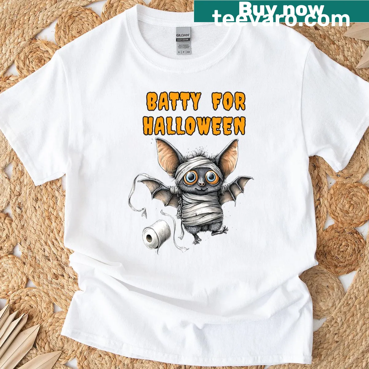 Cute Halloween T-shirt featuring a mummy bat design — on a men's t-shirt