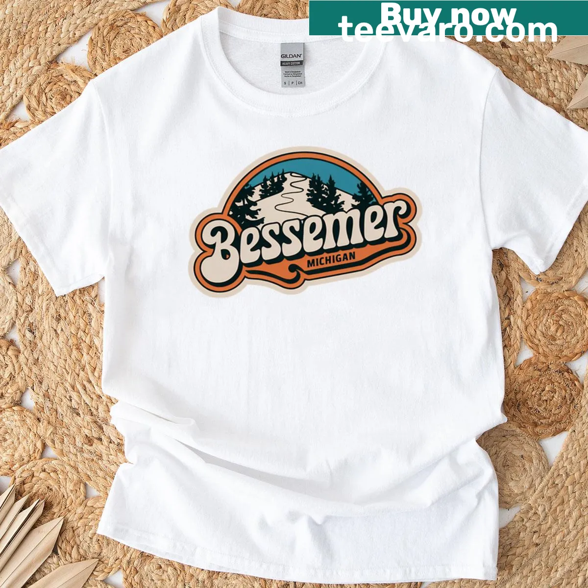 Retro oversized ski hill t-shirt for Bessemer Michigan — on a men's t-shirt