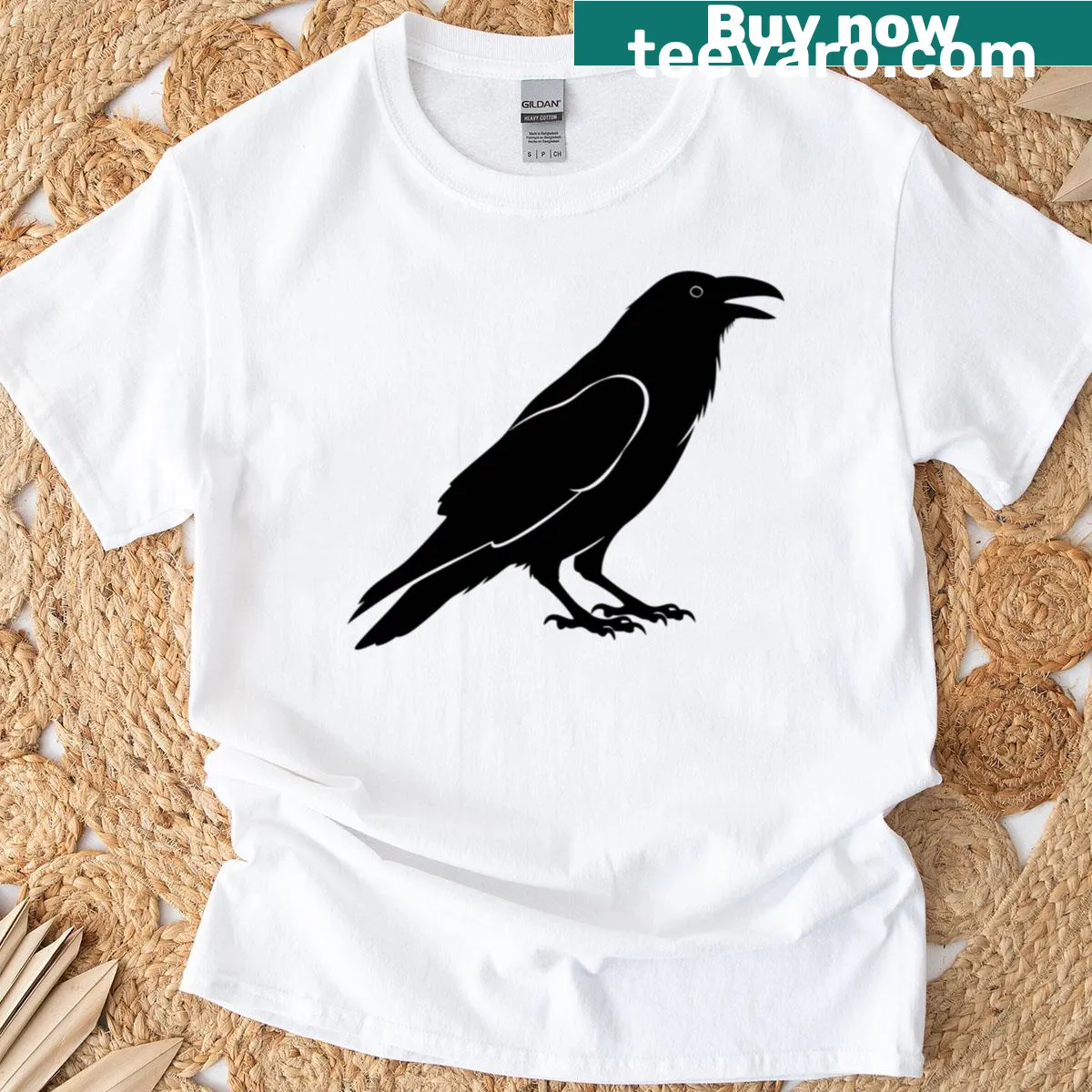 Silhouette illustration of a black raven on a T-shirt — on a men's t-shirt