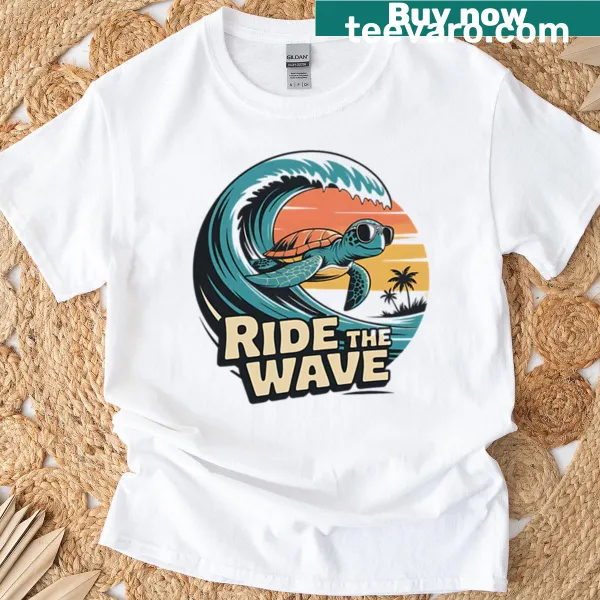 Retro turtle surfer graphic with palm trees on a beach-themed t-shirt