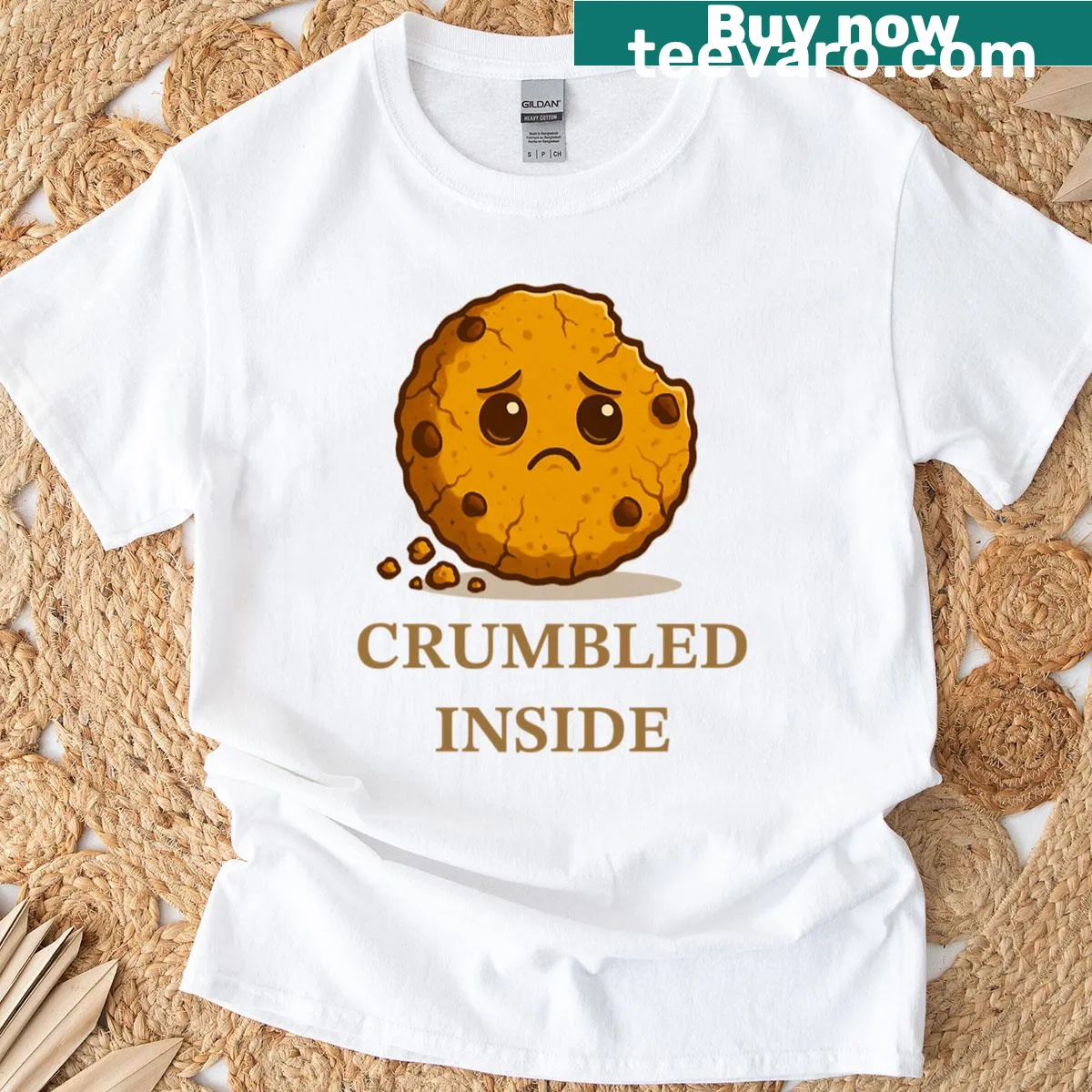 Illustration of a sad, crumbled cookie on a T-shirt — on a men's t-shirt