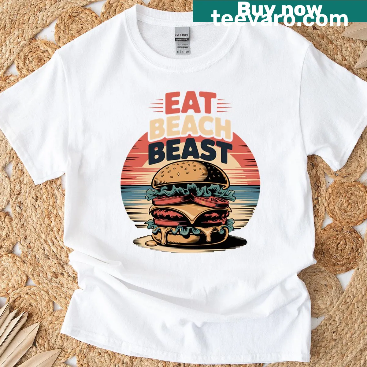 Eat Beach Beast Burger beach-themed graphic t-shirt — on a men's t-shirt