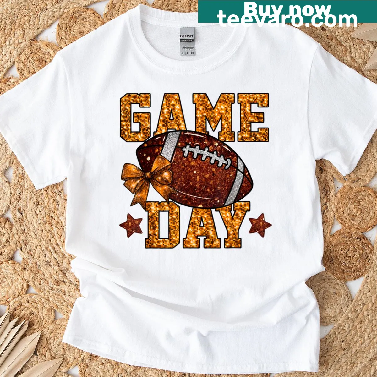 Football Mama t-shirt with orange bow and cheerful typography — on a men's t-shirt