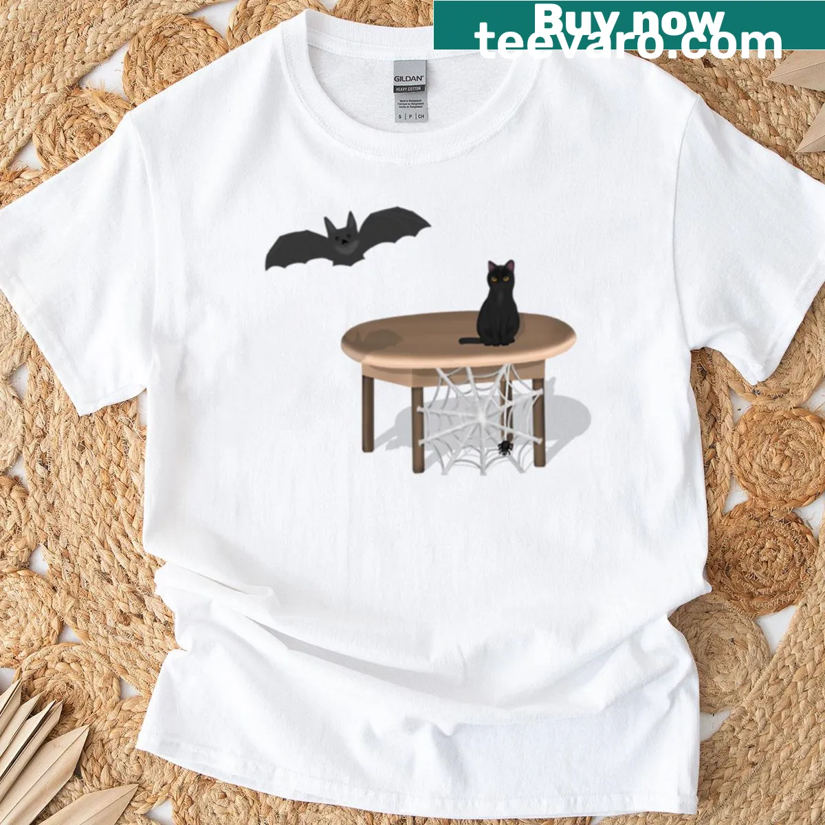 Illustration of a spider, bat, and cat on a t-shirt for Halloween — on a men's t-shirt