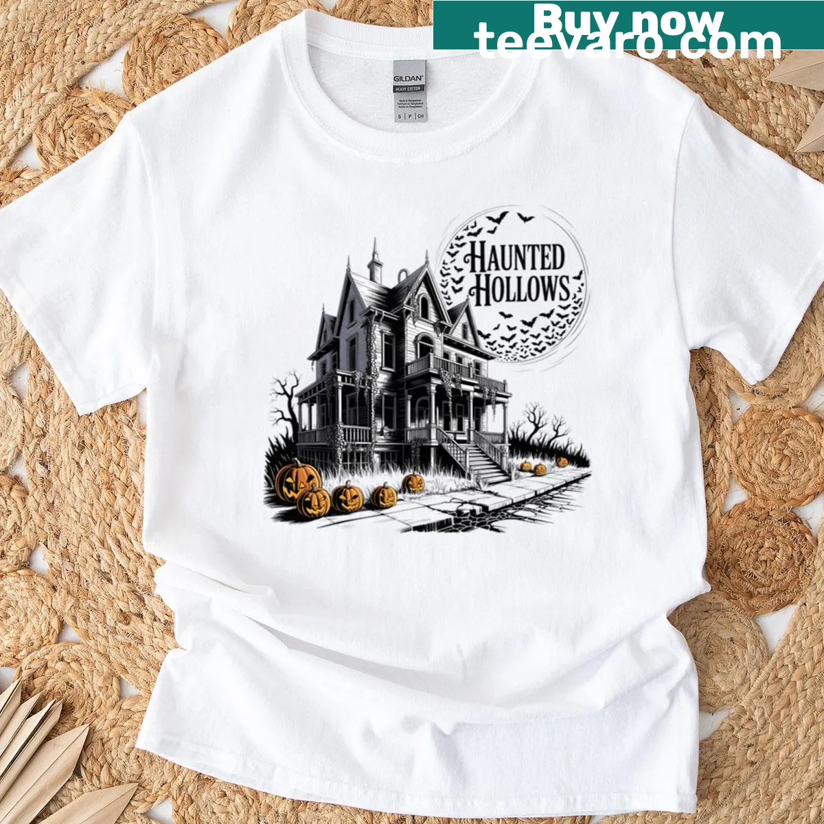 Oversized Haunted Hollows t-shirt with ghostly illustration for Halloween — on a men's t-shirt