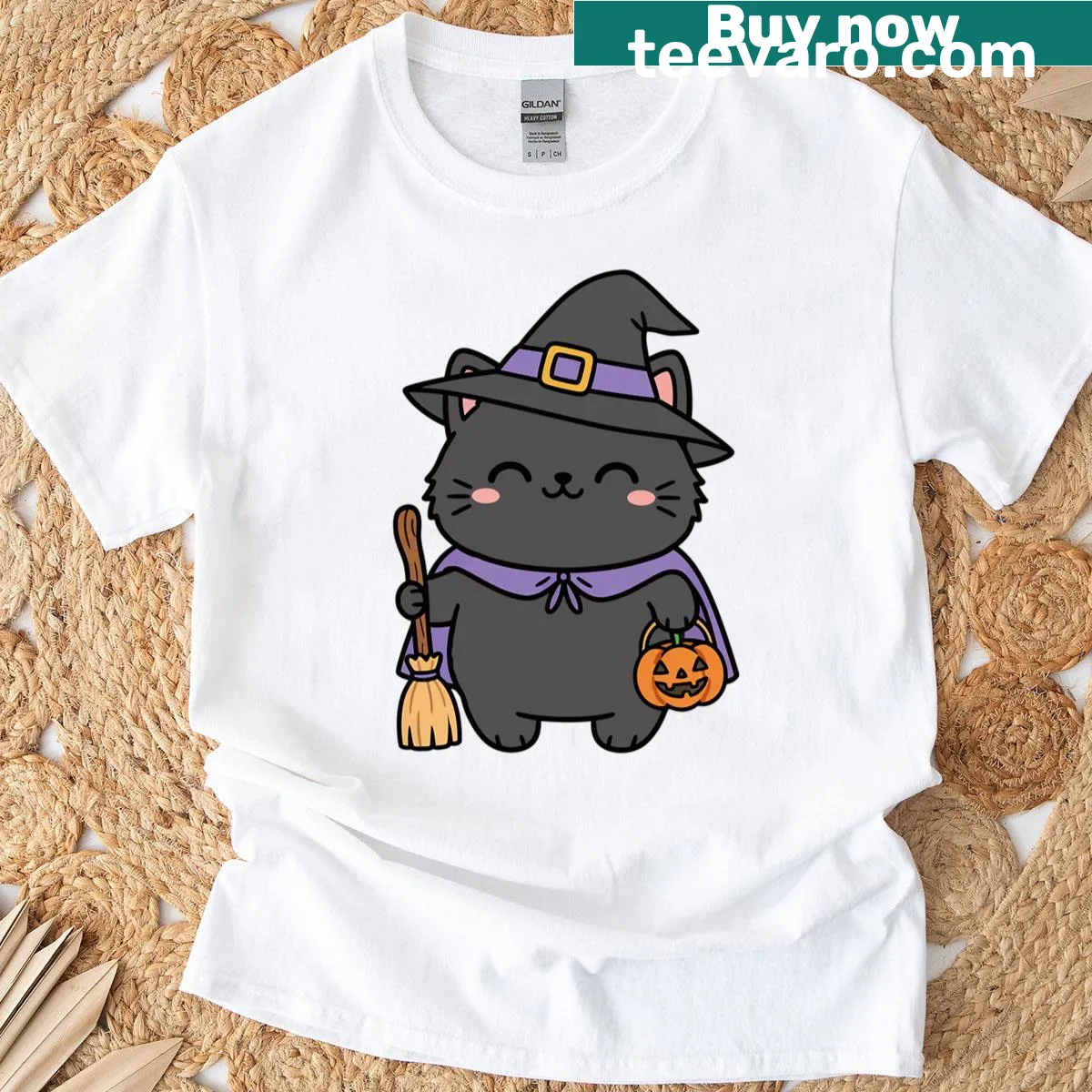 Kawaii black cat witch graphic with pumpkin on T-shirt — on a men's t-shirt