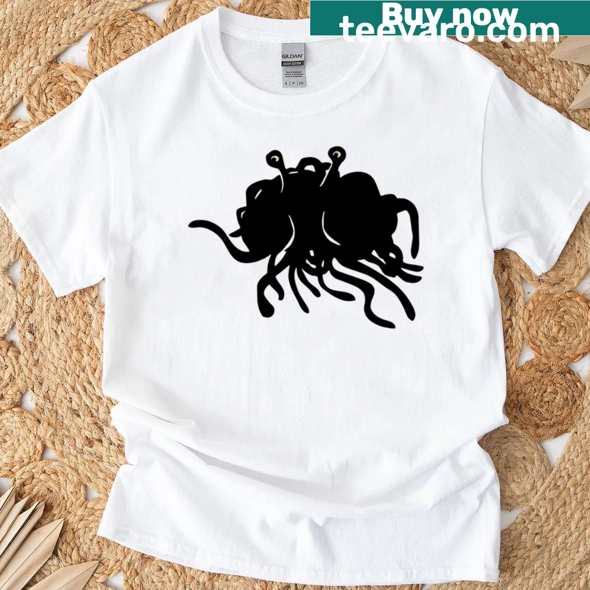 Cartoon depiction of the Flying Spaghetti Monster on a T-shirt — on a men's t-shirt
