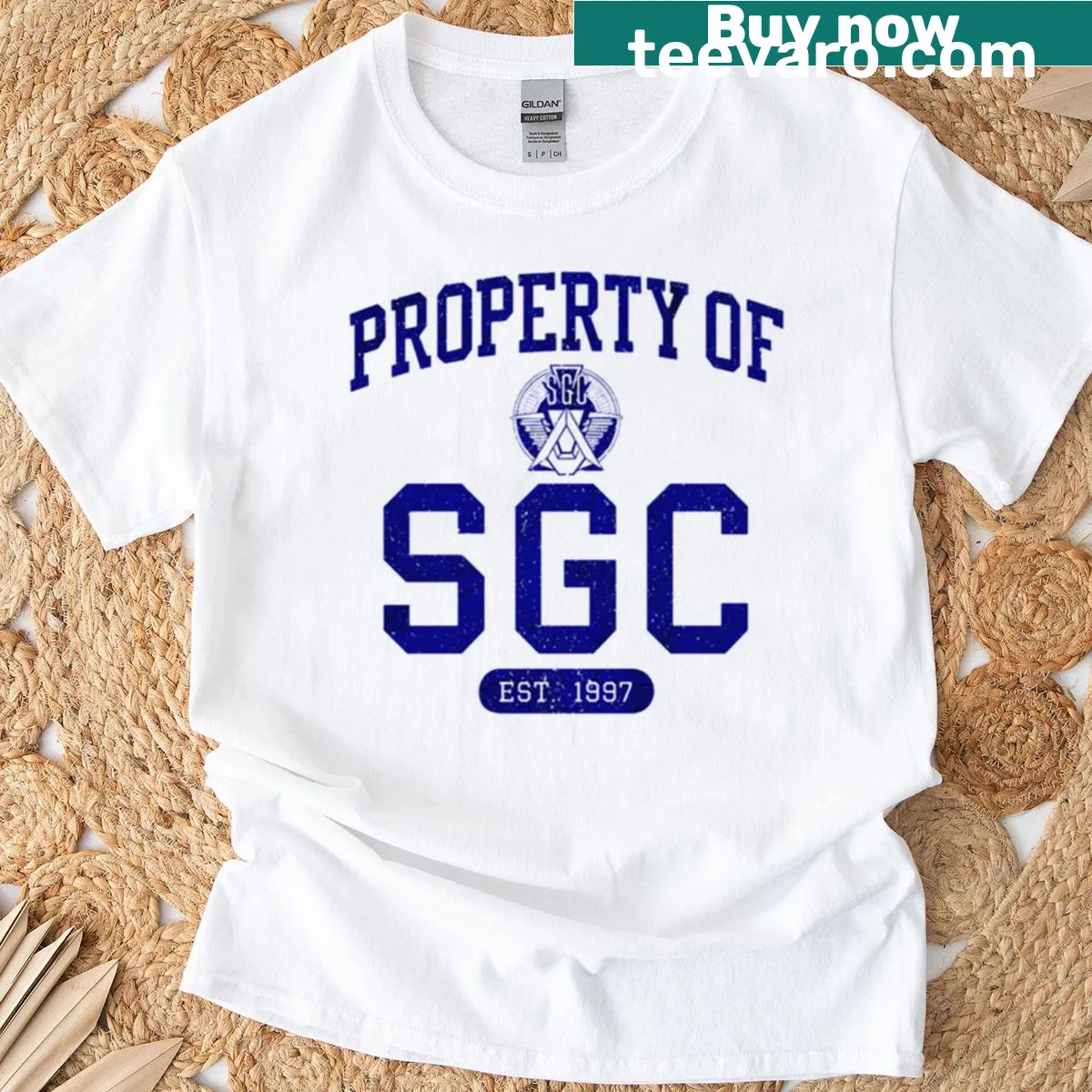Emblem style t-shirt with 'Property Of Fgc Stargate' text — on a men's t-shirt