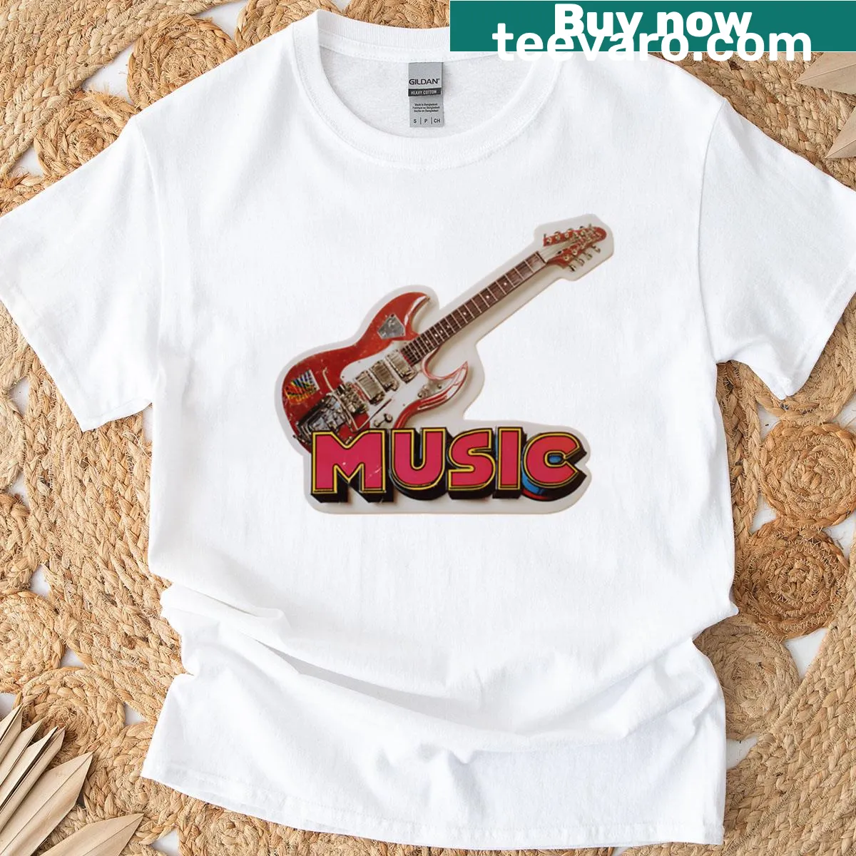 Vintage electric guitar graphic with music text on an oversized t-shirt — on a men's t-shirt