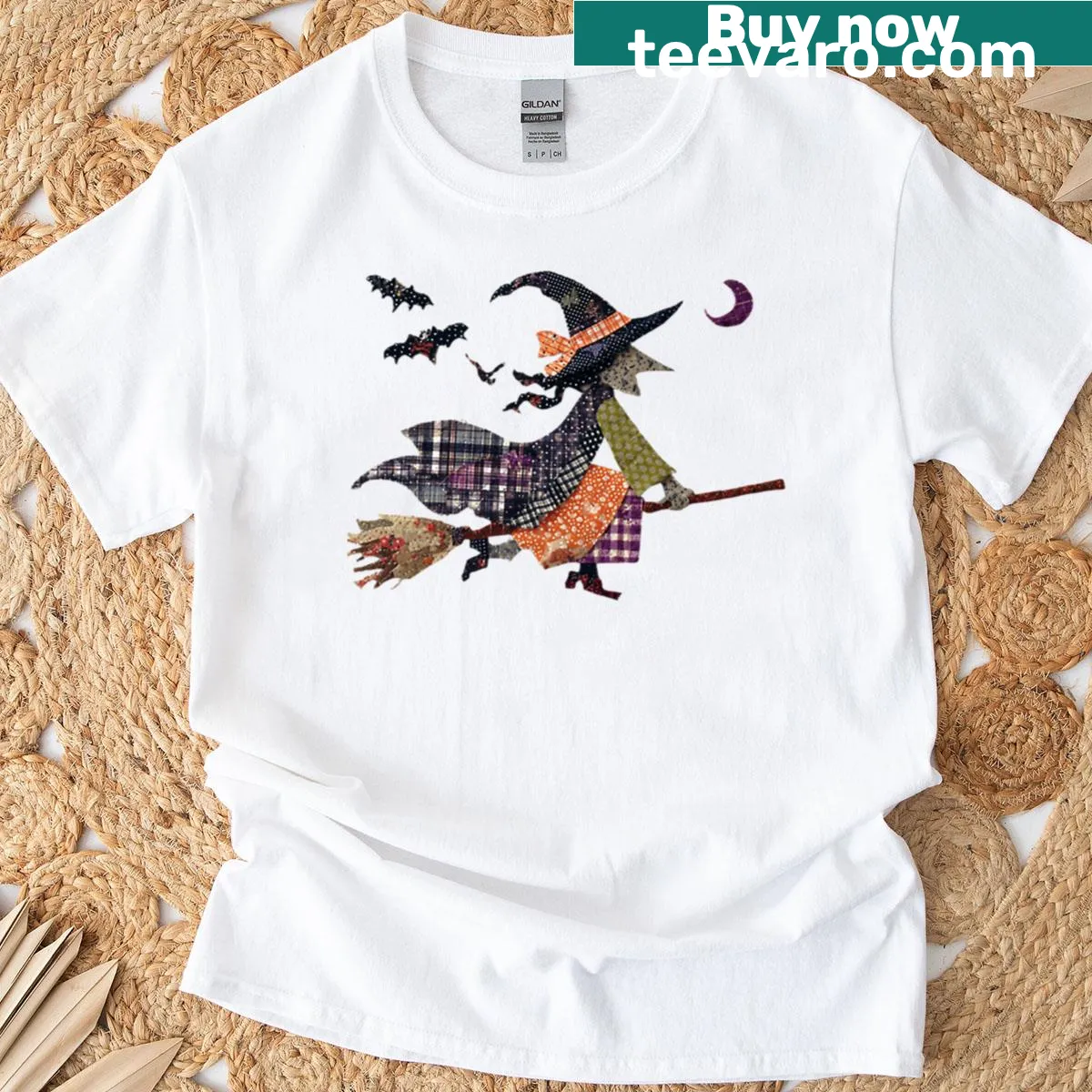 Cozy Halloween T-shirt with patchwork flying witch design — on a men's t-shirt