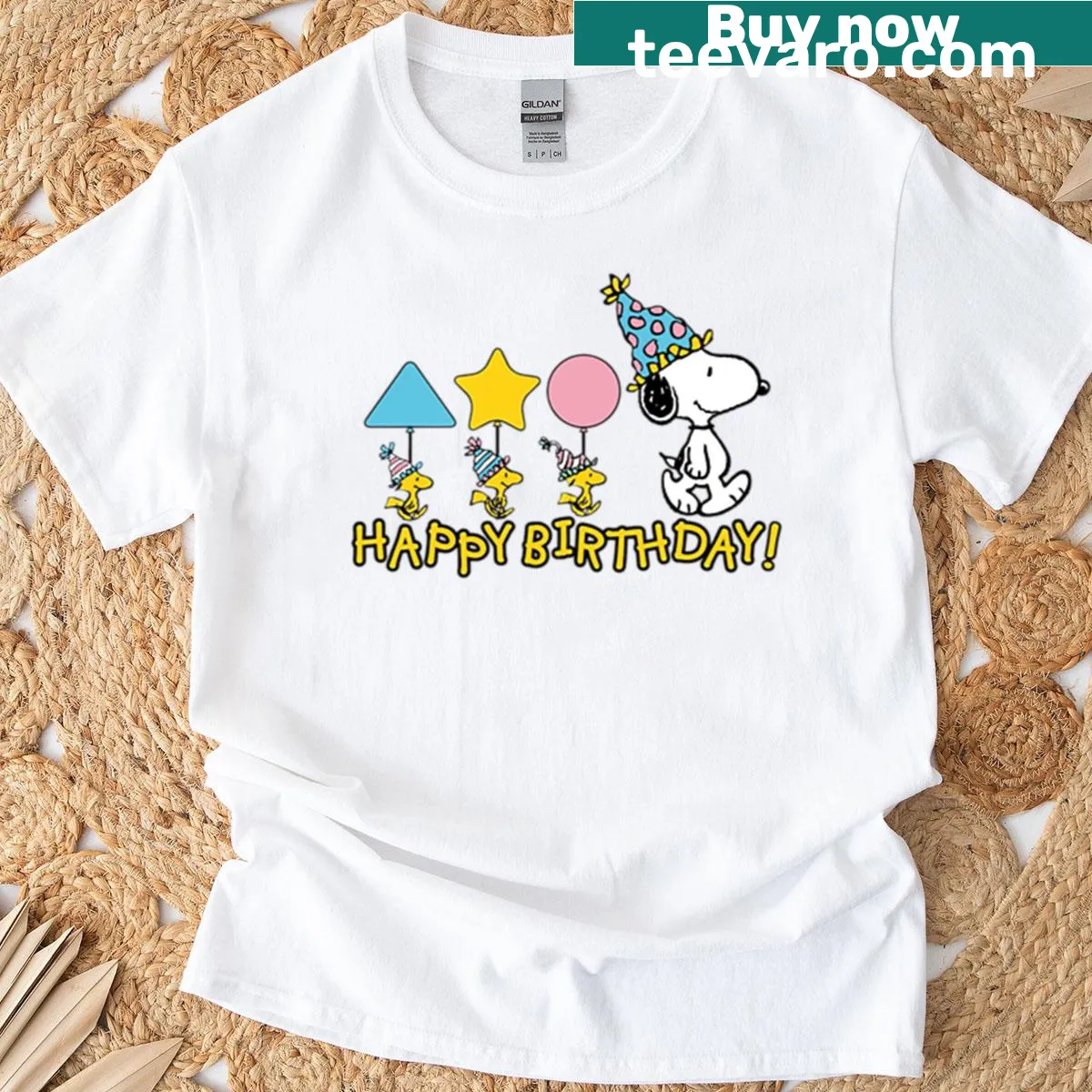 Snoopy celebrating a birthday on a T-shirt — on a men's t-shirt