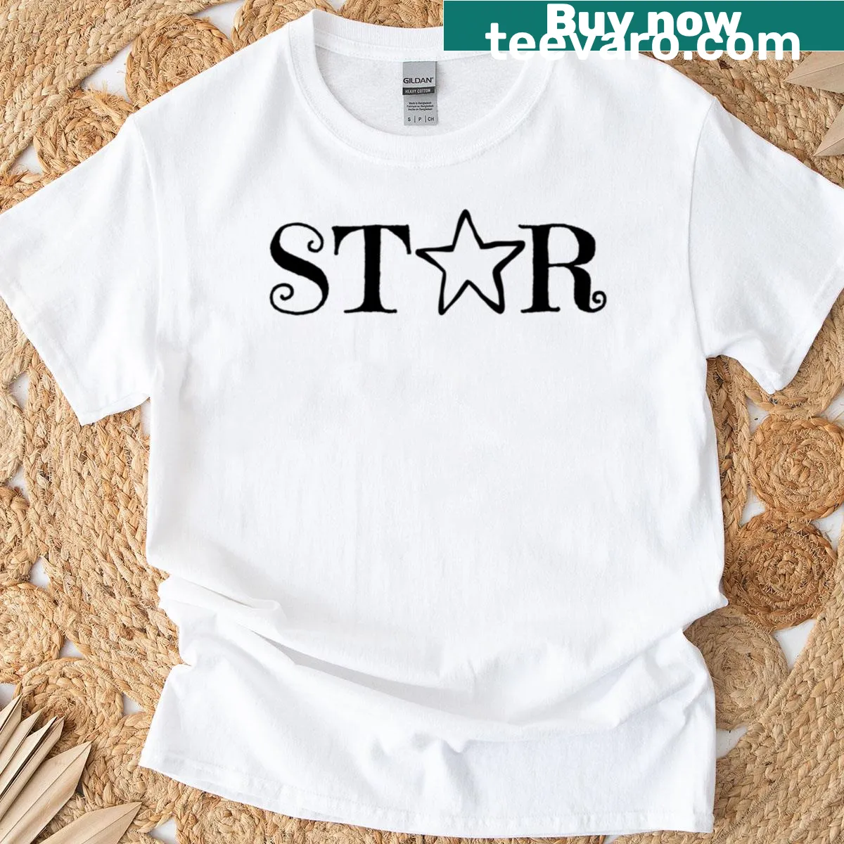 Minimalist star-shaped text design on a t-shirt — on a men's t-shirt