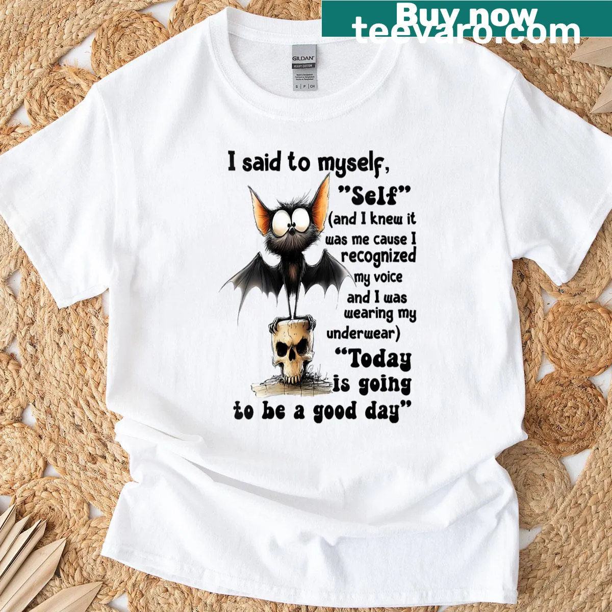 Women’s t-shirt with a bat graphic and humorous phrase — on a men's t-shirt
