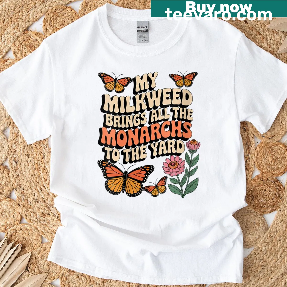 Butterfly graphic t-shirt celebrating milkweed and monarchs — on a men's t-shirt