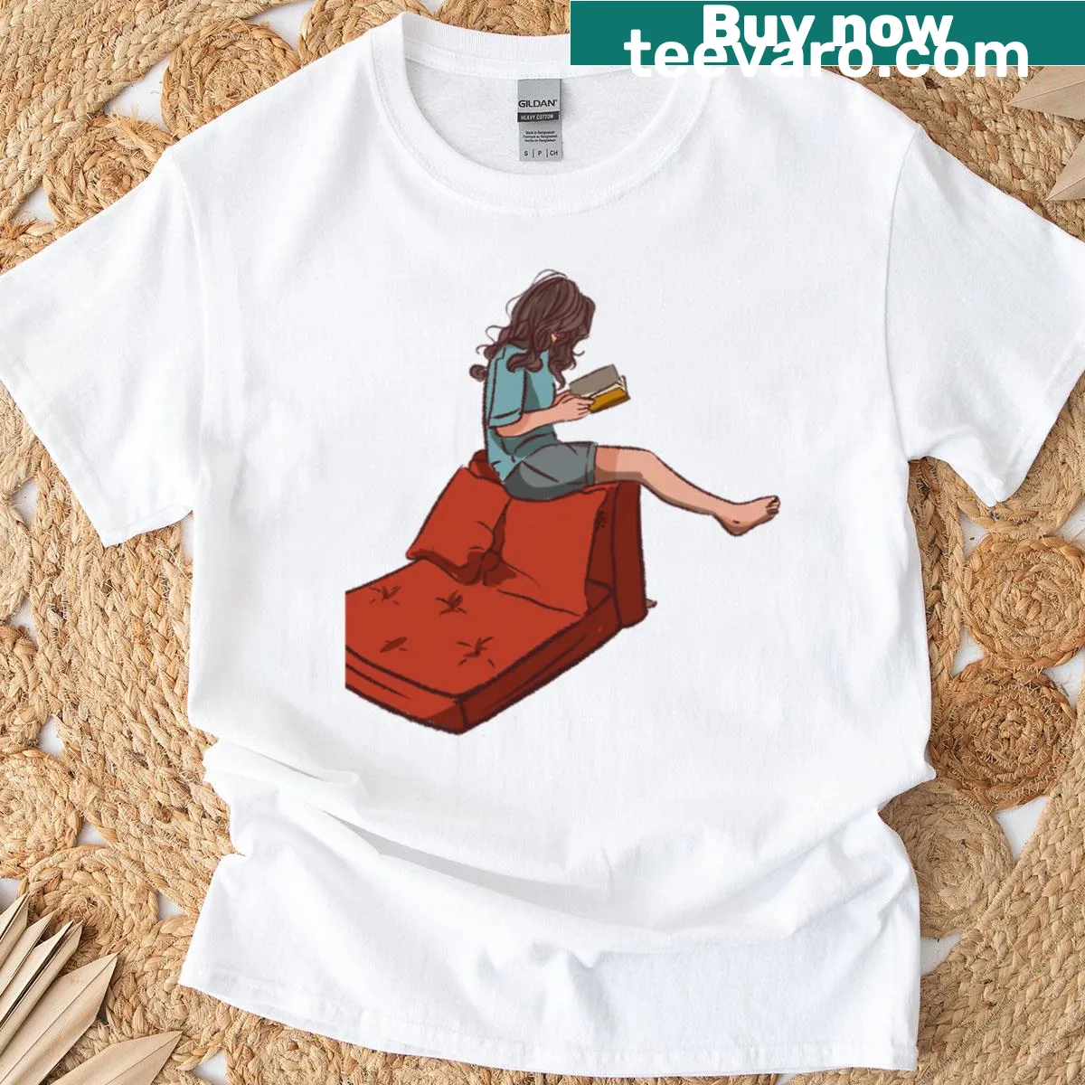 Illustration of a woman reading a book on a red chair. — on a men's t-shirt