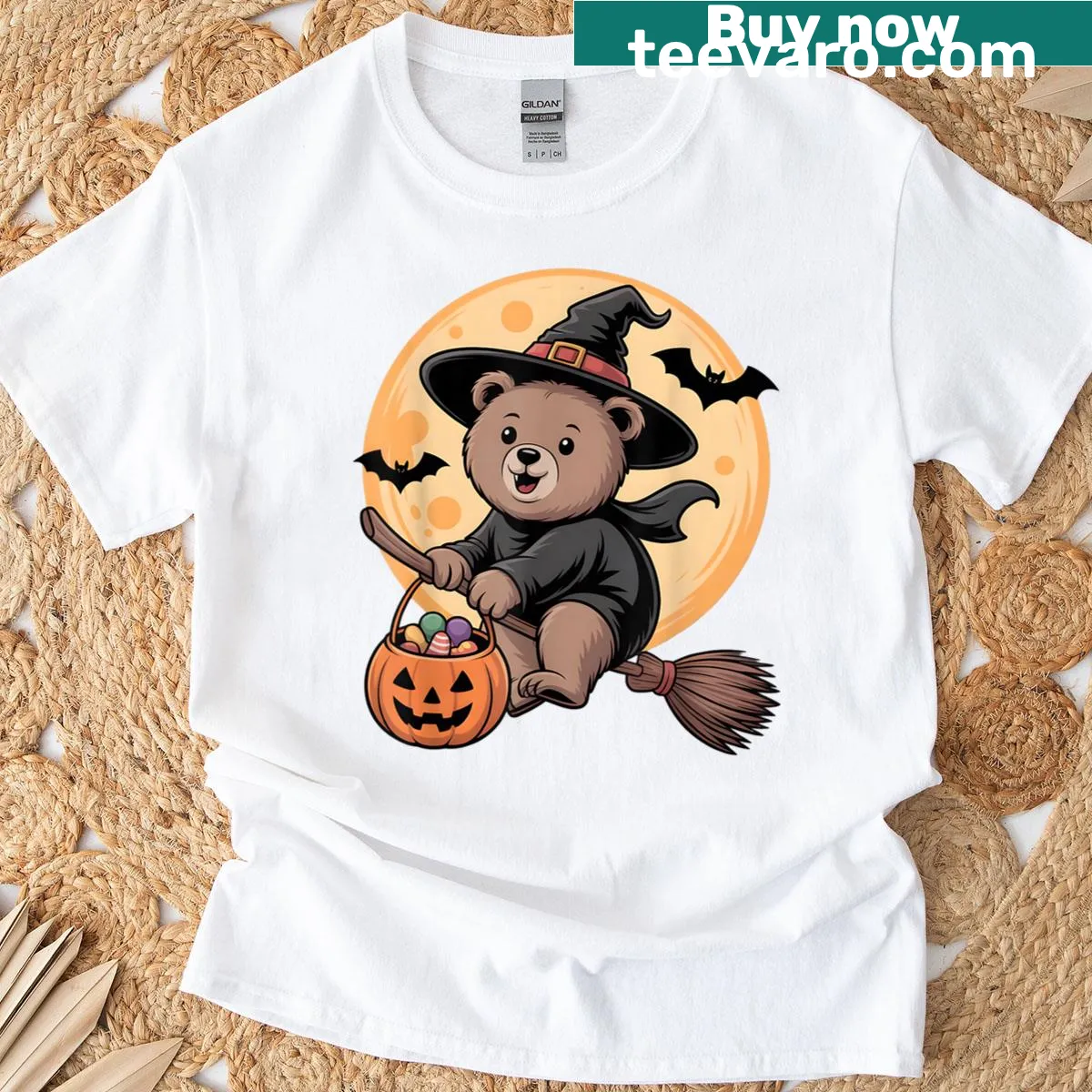 Cute bear in a witch hat with a pumpkin graphic on T-shirt — on a men's t-shirt