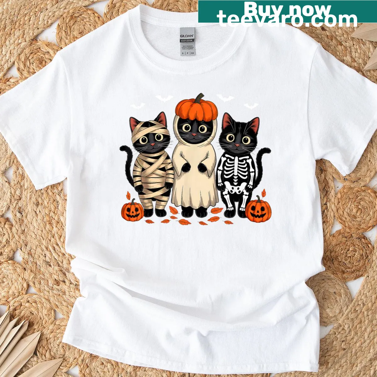 Halloween T-shirt featuring a black cat, skeleton, pumpkin, and ghost — on a men's t-shirt