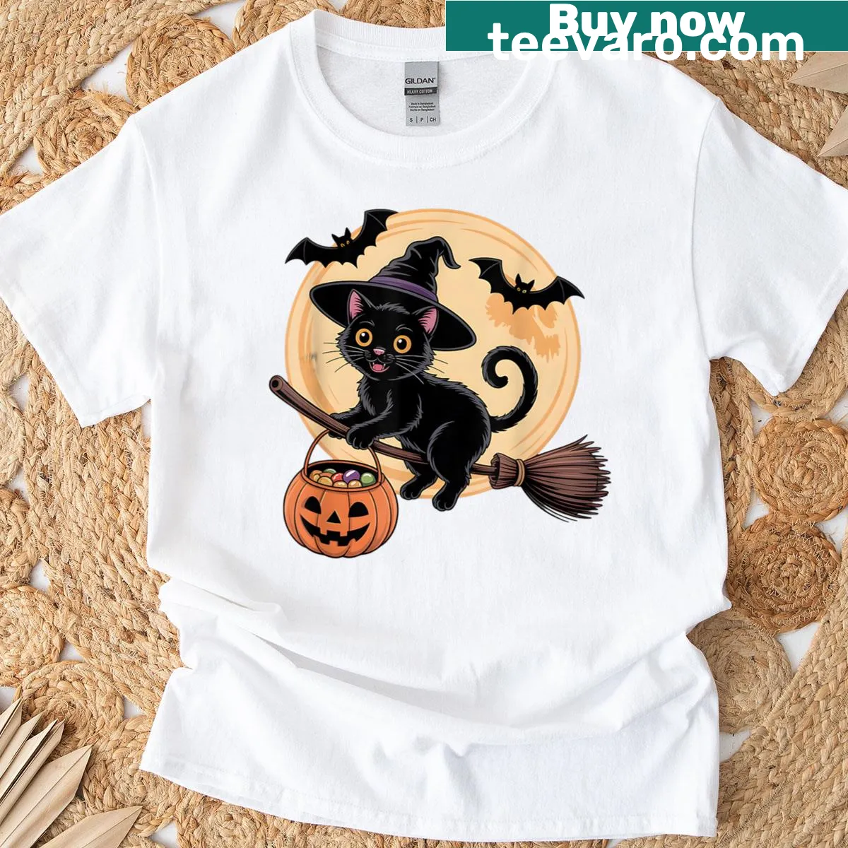Playful black cat in a witch hat with a pumpkin design for Halloween — on a men's t-shirt