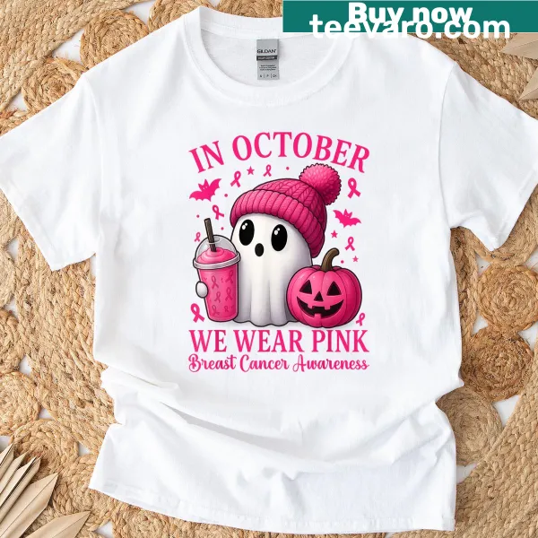 Pink awareness T-shirt featuring the text 'In October We Wear Pink' for Halloween.
