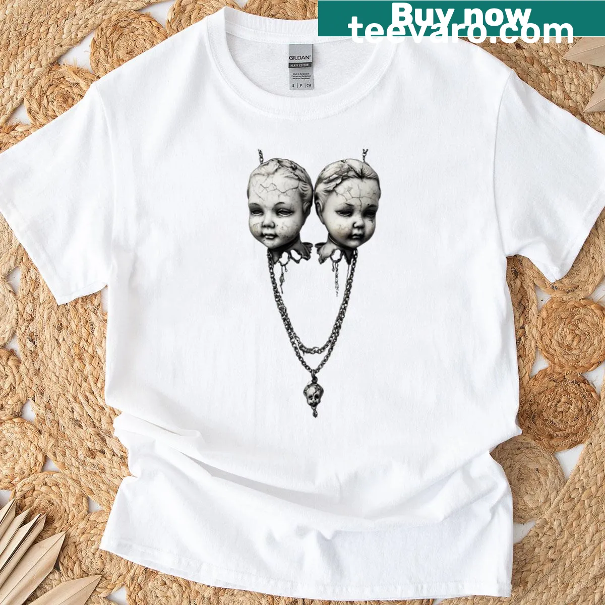 Illustrated creepy doll head necklace graphic for Halloween — on a men's t-shirt