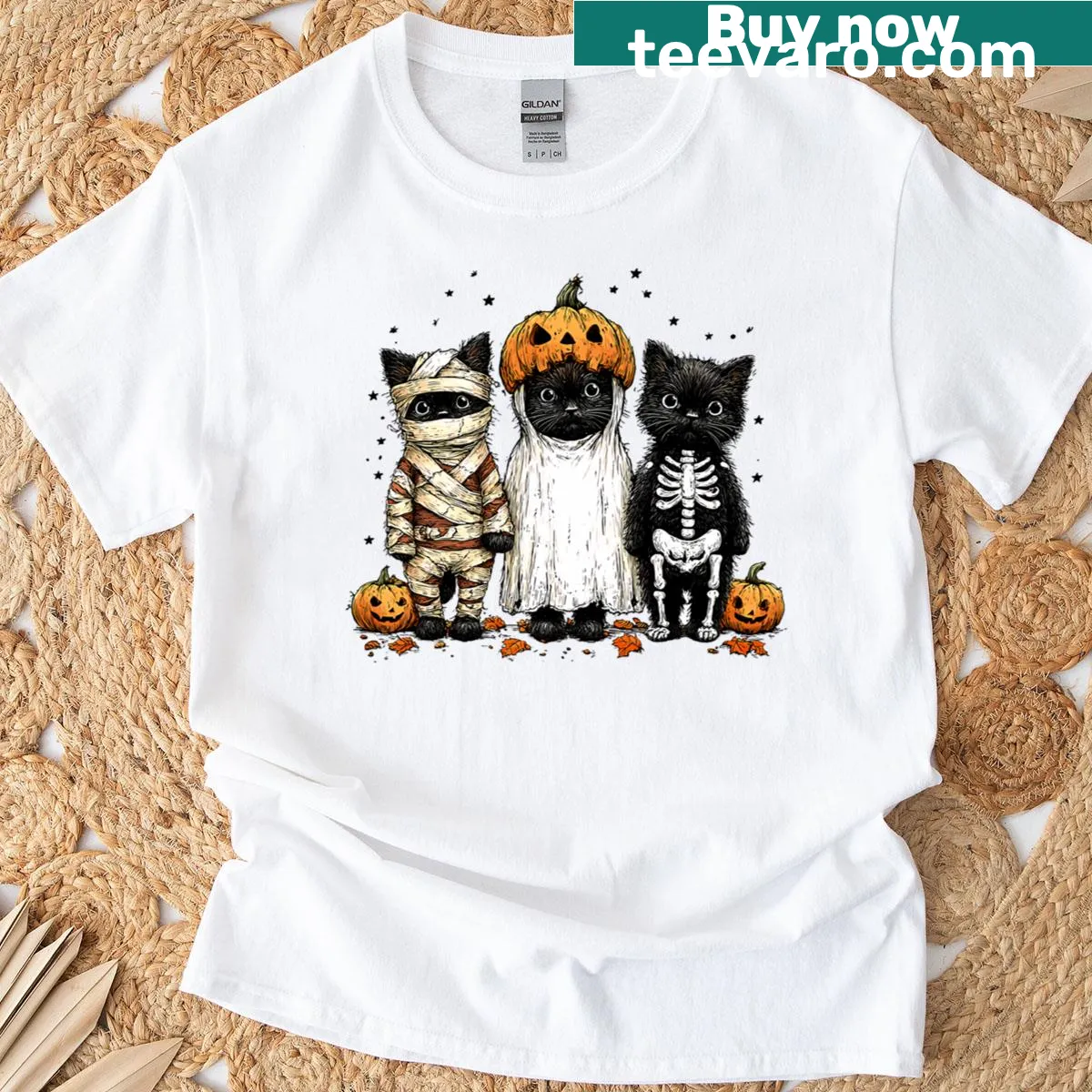 Cute black cats in Halloween costumes graphic on a t-shirt — on a men's t-shirt