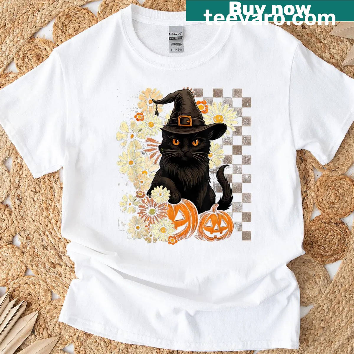 Vintage-style Halloween T-shirt with a cute cat and pumpkin design. — on a men's t-shirt