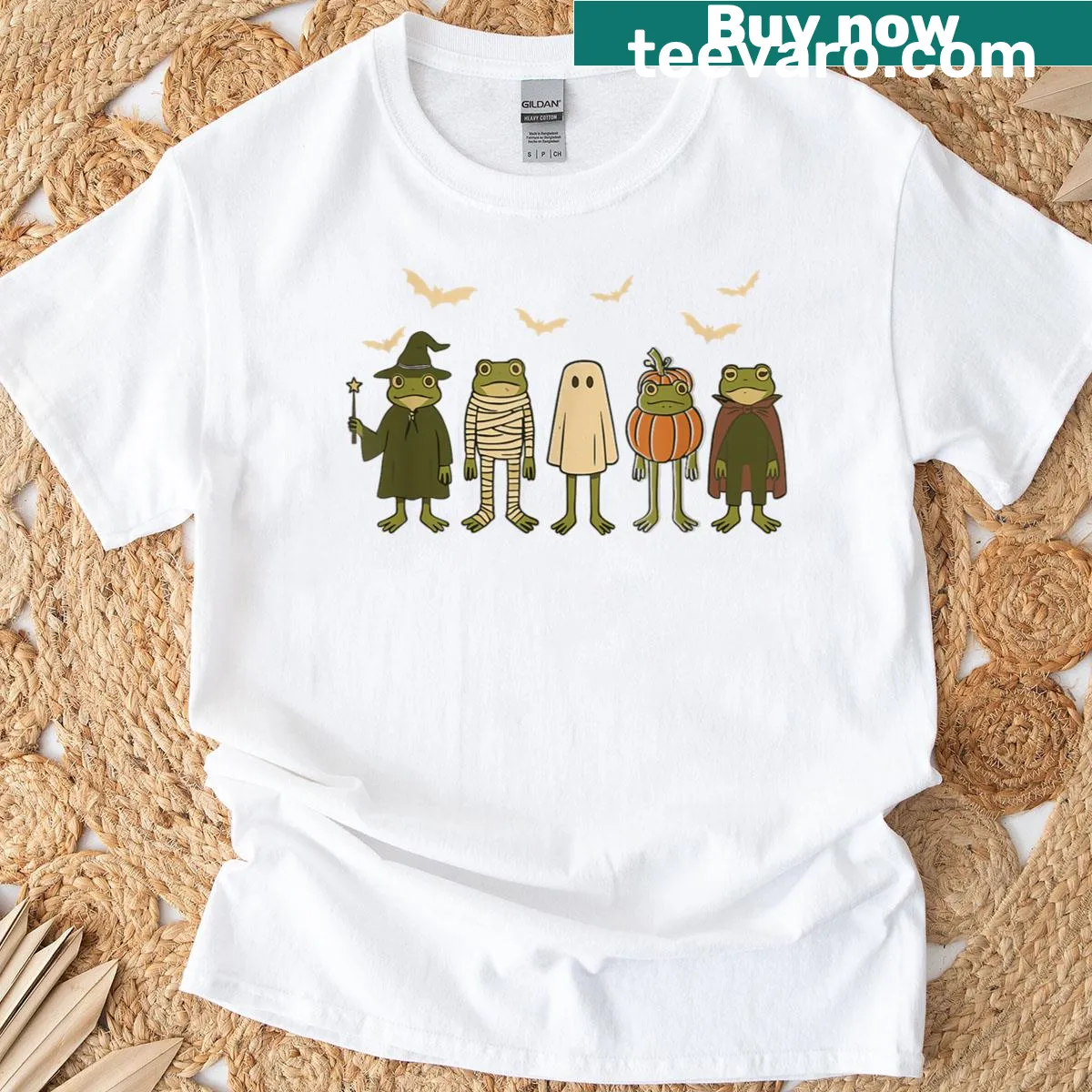 Cute frogs in Halloween costumes with pumpkins graphic on a T-shirt — on a men's t-shirt