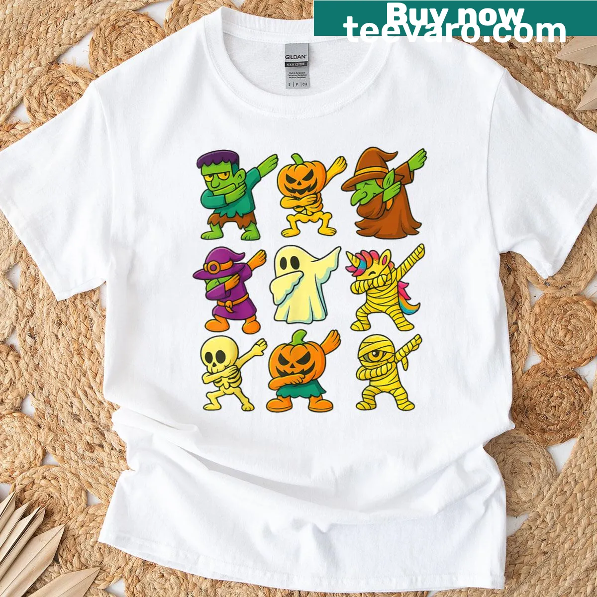 Dabbing skeleton with Halloween elements graphic t-shirt — on a men's t-shirt