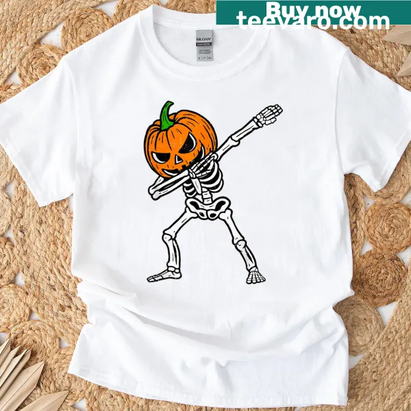 Cartoon dabbing skeleton with pumpkin graphic on a Halloween t-shirt