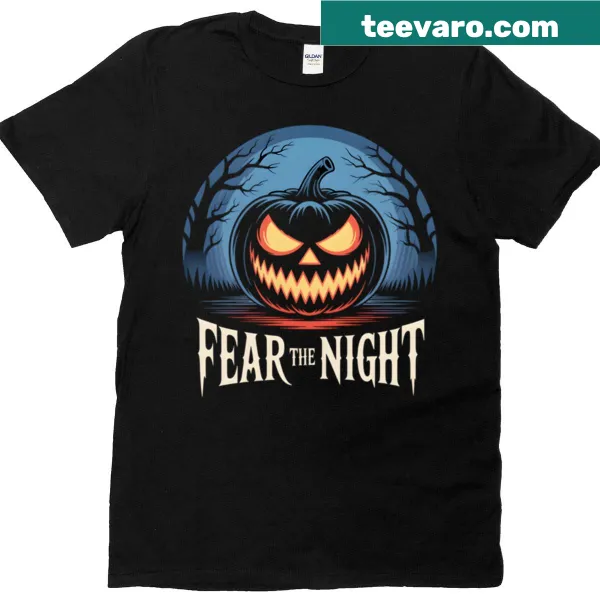 Evil pumpkin graphic with 'Fear The Night' text on dark t-shirt