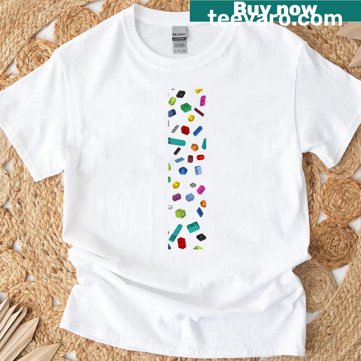 T-shirt featuring an edgy falling bricks graphic design — on a men's t-shirt