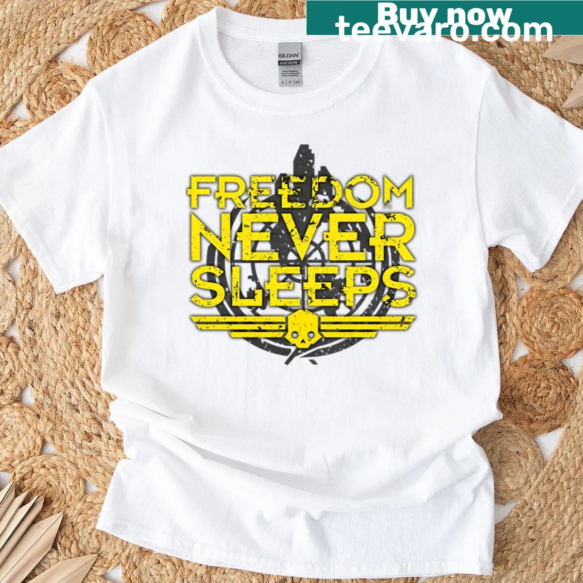 Bold 'Freedom Never Sleeps' text on a worn design T-shirt — on a men's t-shirt