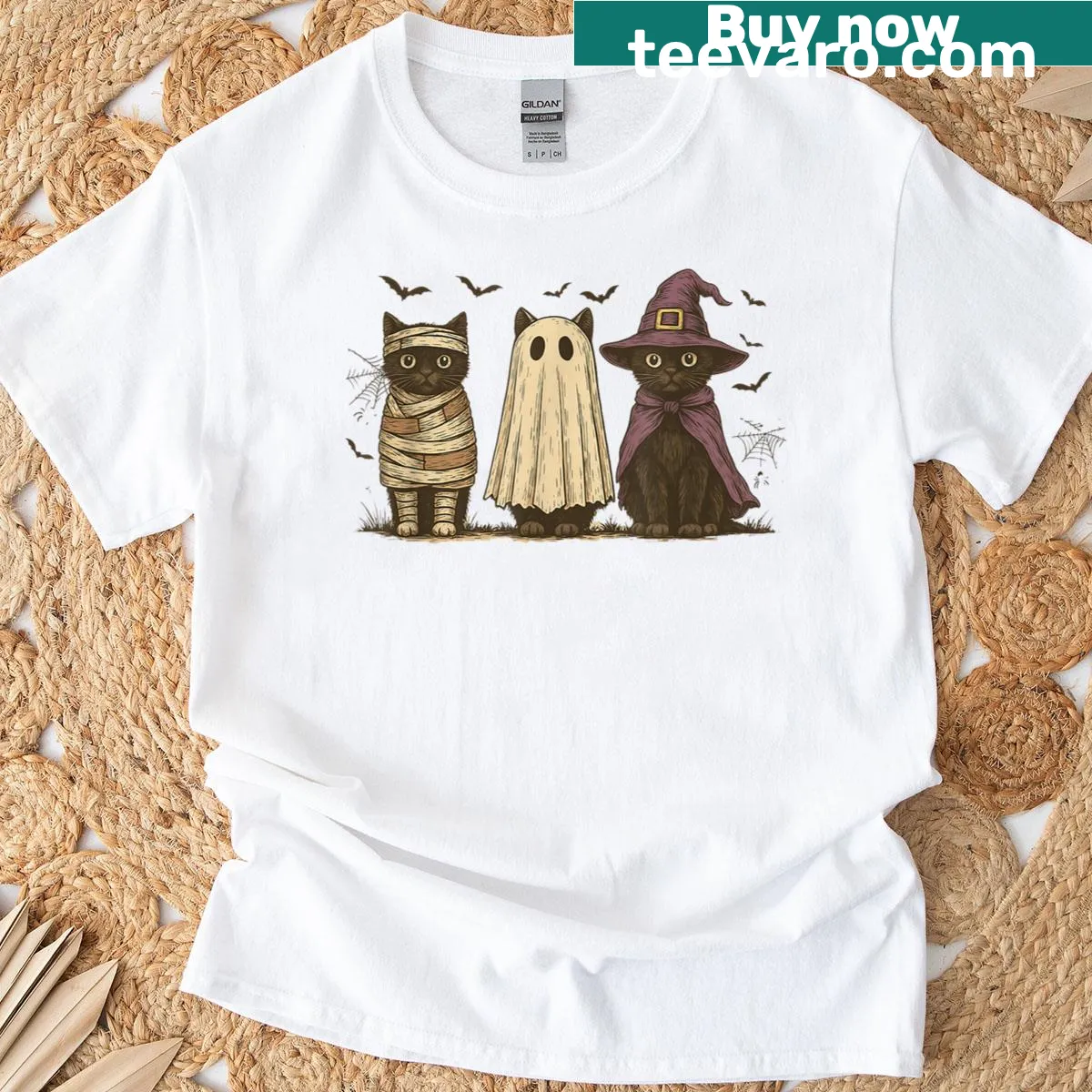 Cartoon Halloween T-shirt with a black cat witch and pumpkins — on a men's t-shirt