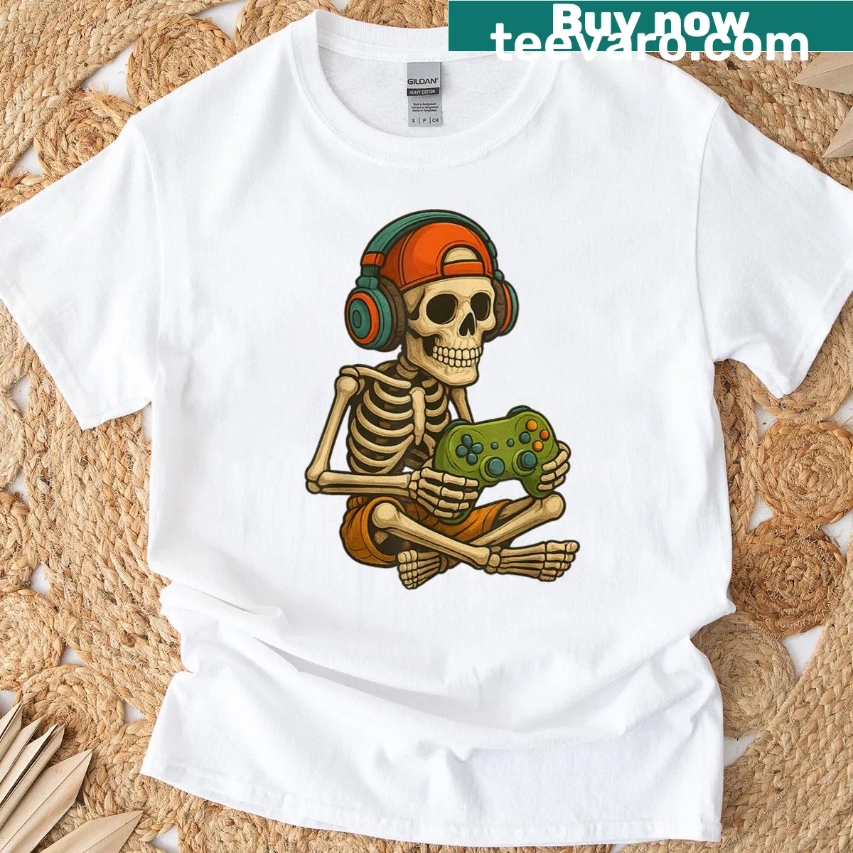 Halloween t-shirt featuring a skeleton with a video game controller — on a men's t-shirt