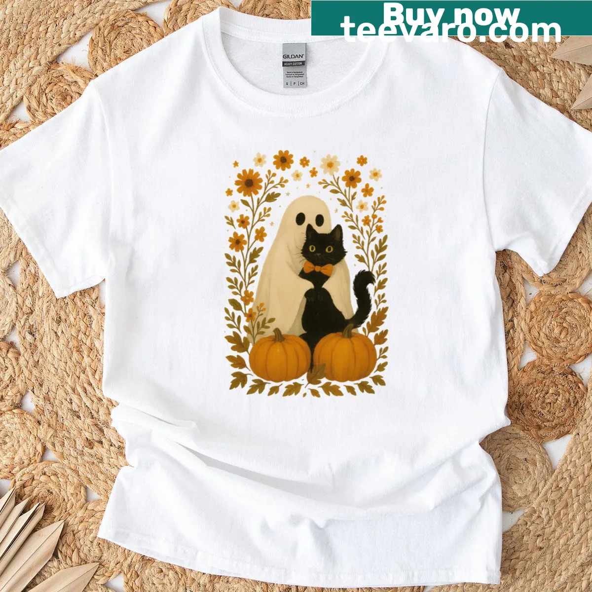 Cute Halloween t-shirt with ghost, black cat, and floral design — on a men's t-shirt