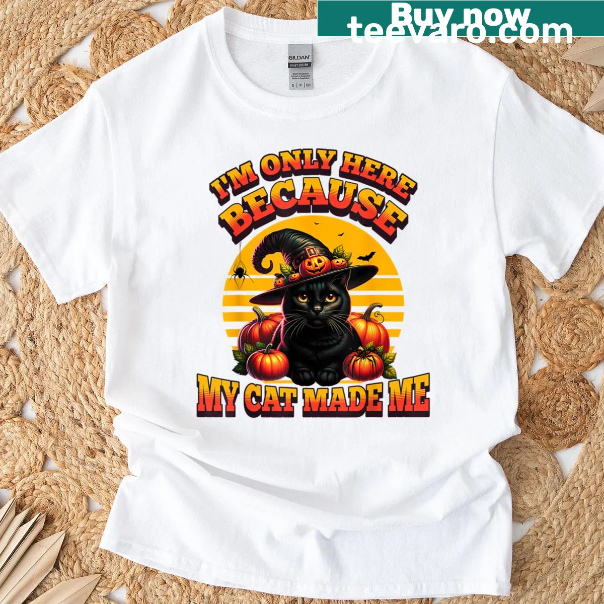 Humorous T-shirt with 'I'm Only Here Because My Cat Made Me' saying — on a men's t-shirt