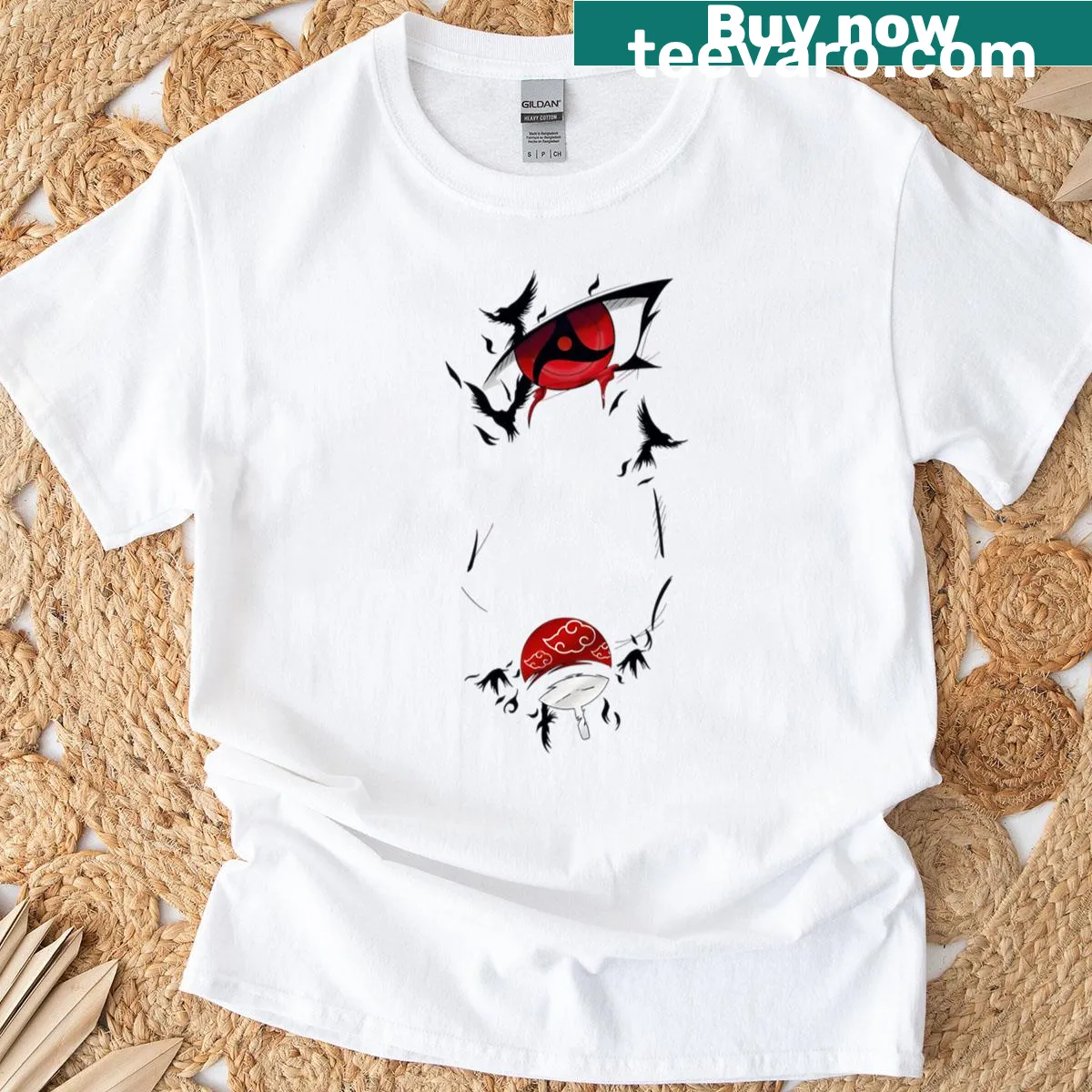Minimalist Itachi Uchiha t-shirt featuring Sharingan and crow design — on a men's t-shirt