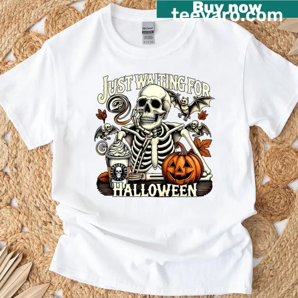 Skeleton drinking coffee with pumpkins graphic on a t-shirt