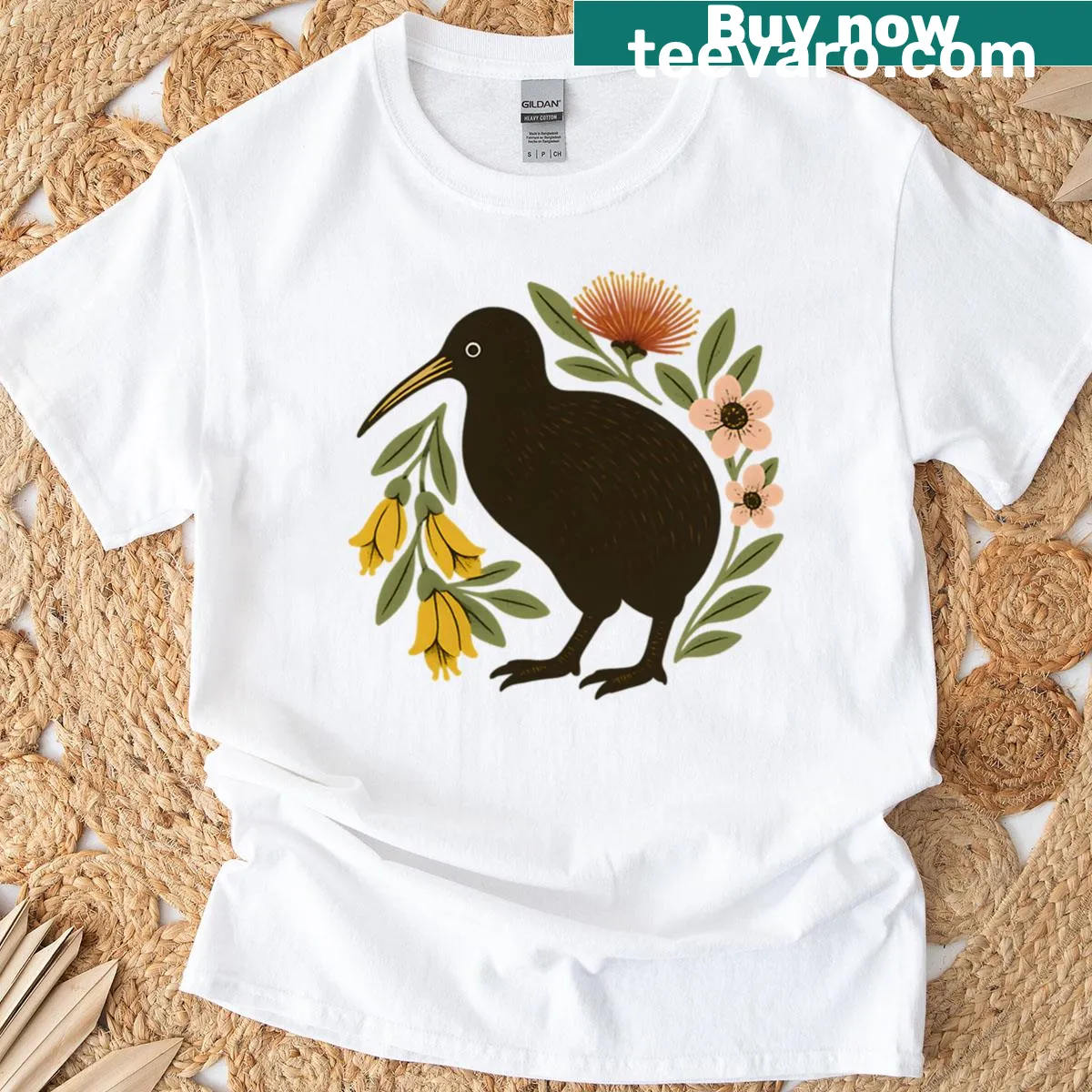 Vintage kiwi t-shirt with a floral design featuring Kwhai flowers — on a men's t-shirt