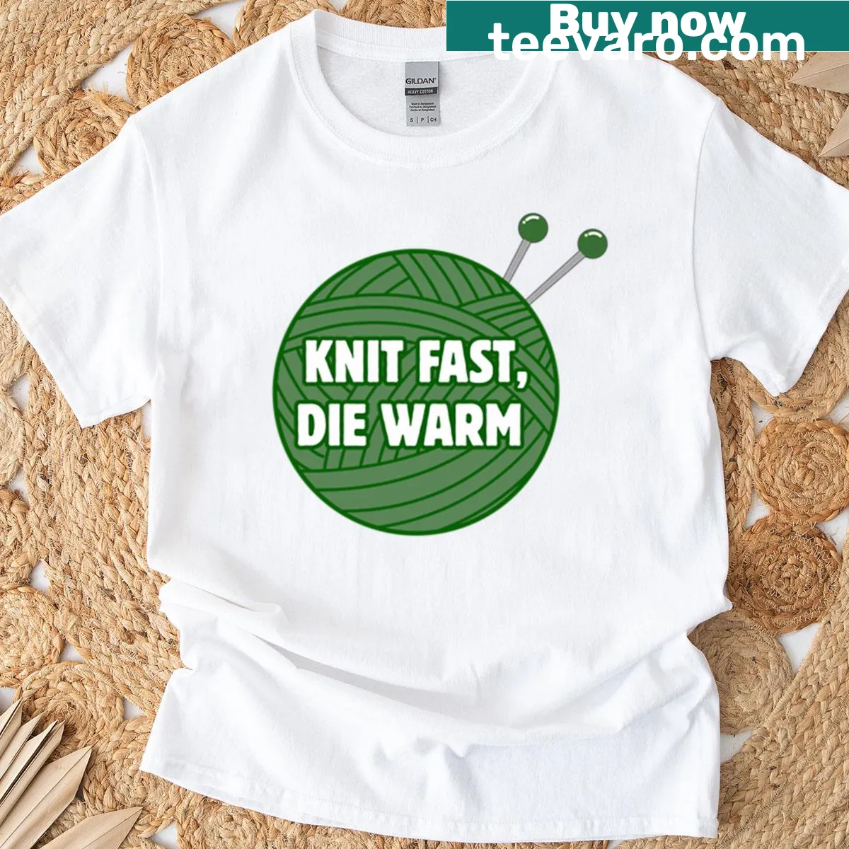 Funny knitting quote t-shirt with 'Knit Fast Die Warm' text in green — on a men's t-shirt