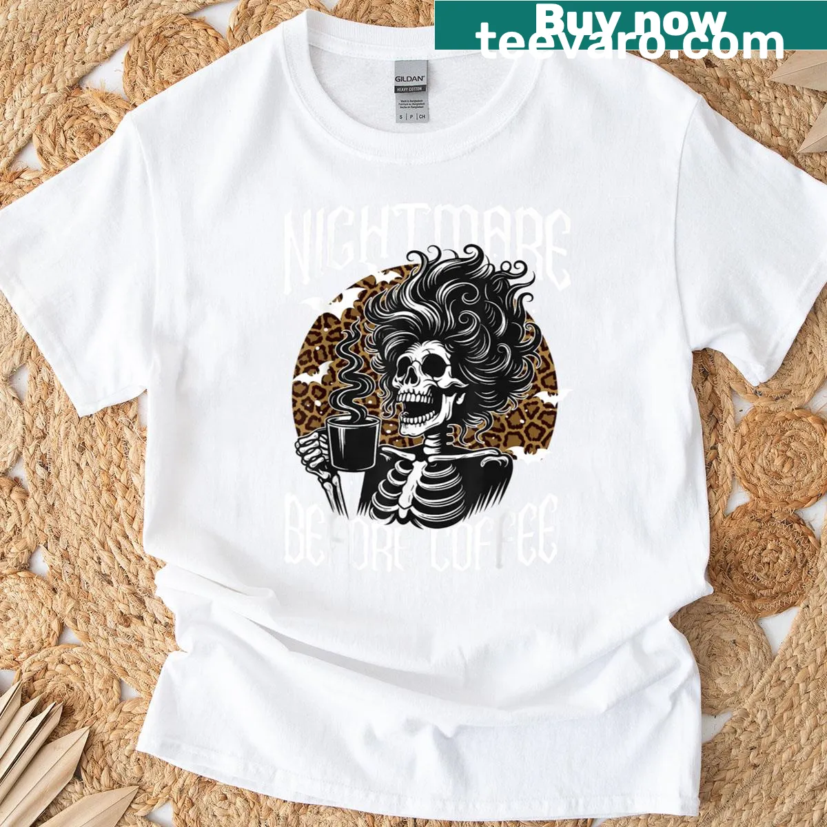 Skeleton with messy bun and 'Nightmare Before Coffee' text on t-shirt — on a men's t-shirt