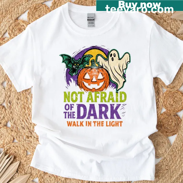 Vintage Christian T-shirt with the phrase 'Not Afraid Of The Dark Walk In The Light'