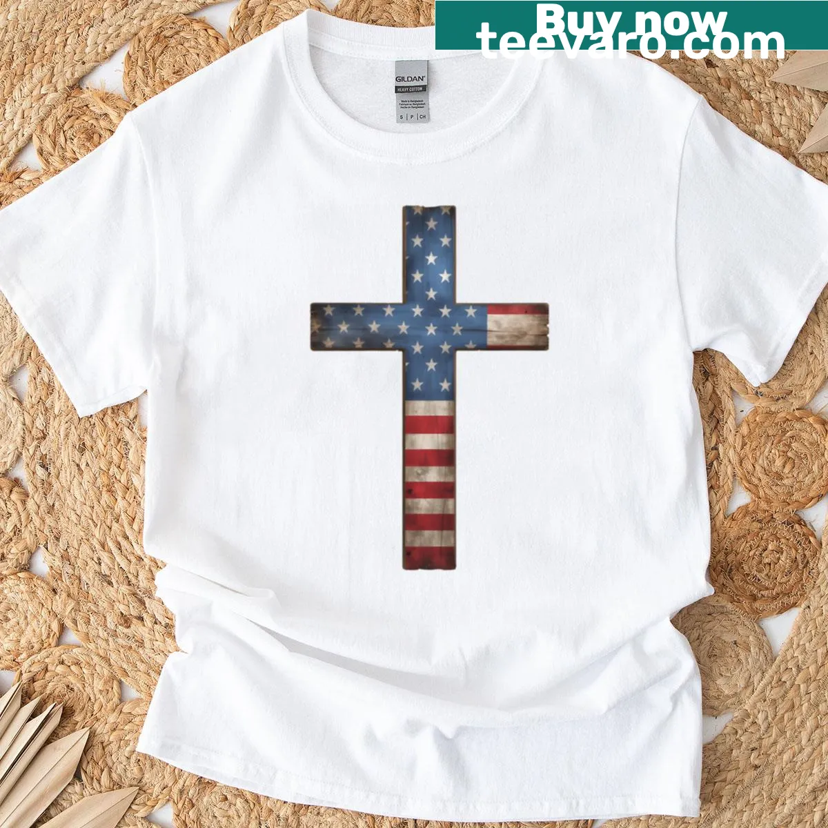 Rugged cross graphic with American flag pattern on T-shirt — on a men's t-shirt