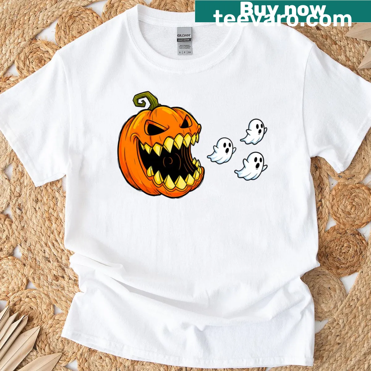 Funny Halloween t-shirt with a ghost chasing a pumpkin illustration — on a men's t-shirt